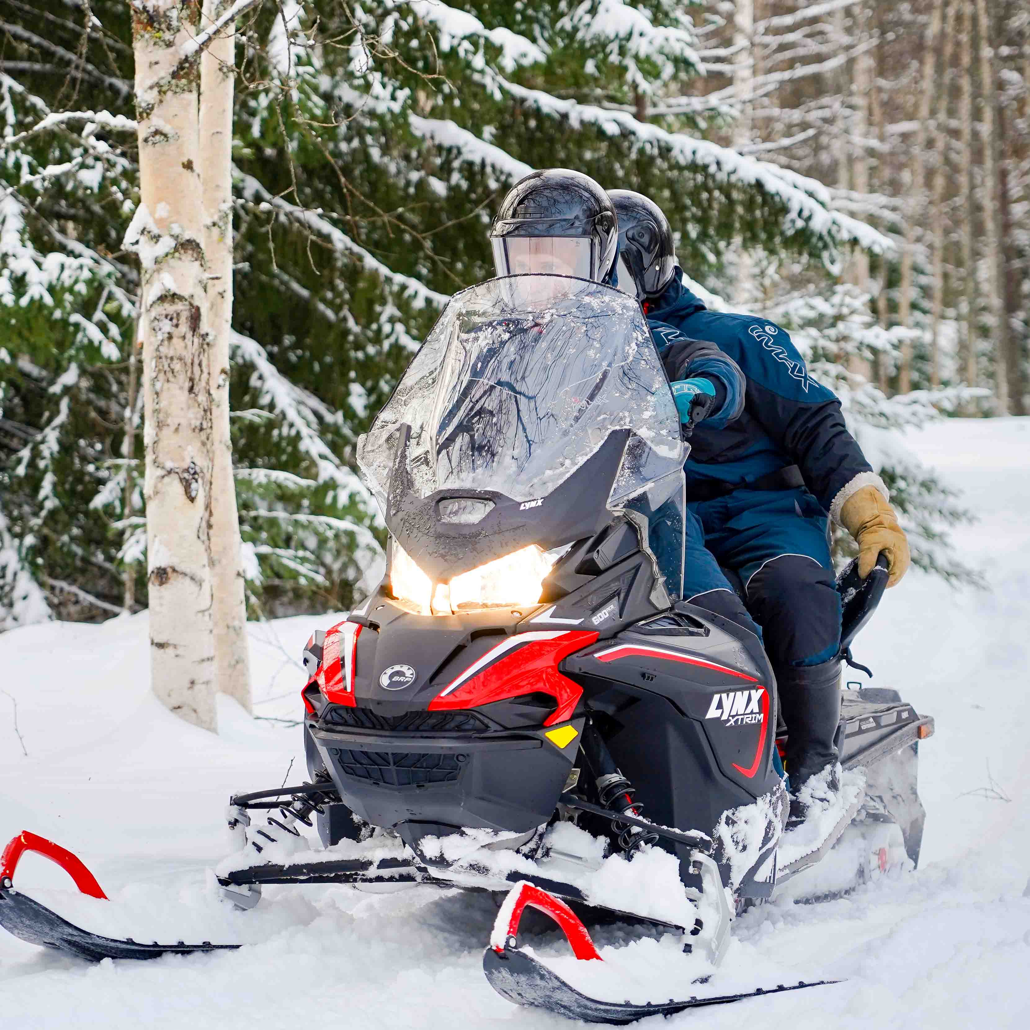 Snowmobile safari across the Arctic wilderness